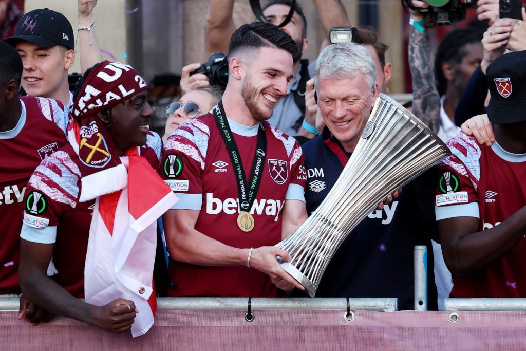 Arsenal midfielder Declan Rice celebrates with David Moyes after winning Europa Conference League at West Ham United