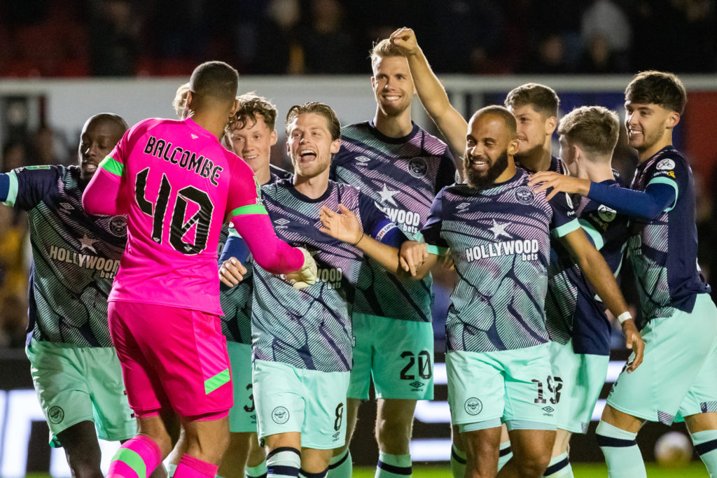 Brentford players celebrate beating Newport County in Carabao Cup second round
