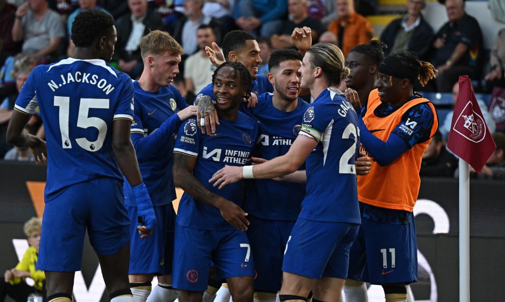 Chelsea winger Raheem Sterling in action vs Burnley in Premier League amid Paul Merson warning to Arsenal and Oleksandr Zinchenko