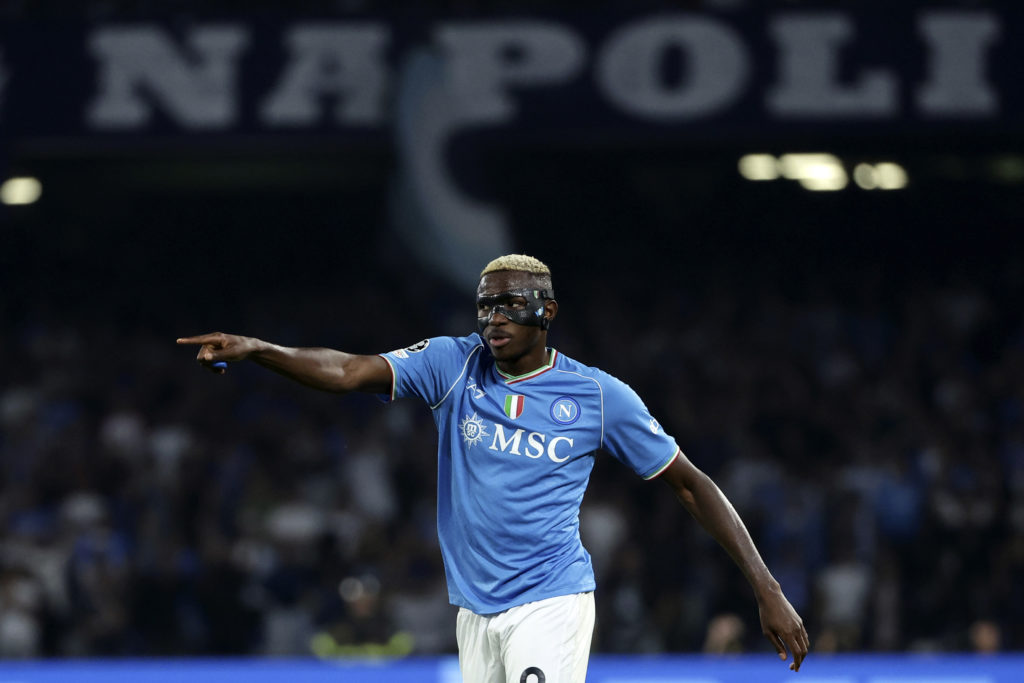 SSC Napoli striker Victor Osimhen in Champions League action vs Real Madrid amid transfer interest from Arsenal and Chelsea