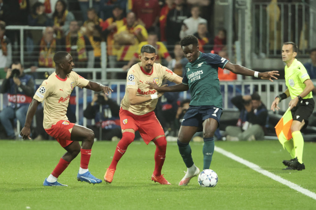 Arsenal winger Bukayo Saka in action vs RC Lens before suffering hamstring injury