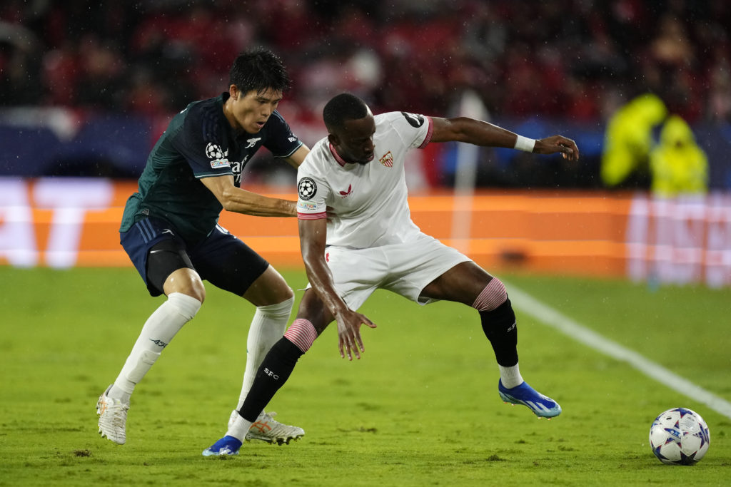 Arsenal defender Takehiro Tomiyasu in Group B - UEFA Champions League 2023/24 action v Sevilla amid praise from Ian Wright