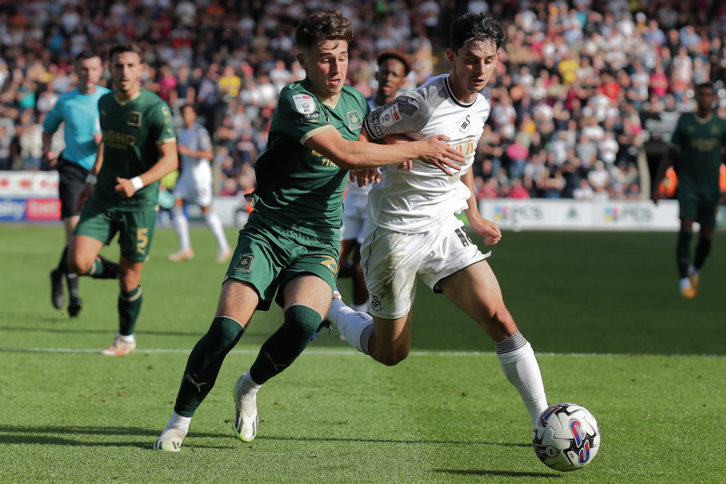 Arsenal midfielder Charlie Patino in action for Swansea City v Plymouth Argyle in EFL Championship amid transfer interest from Juventus