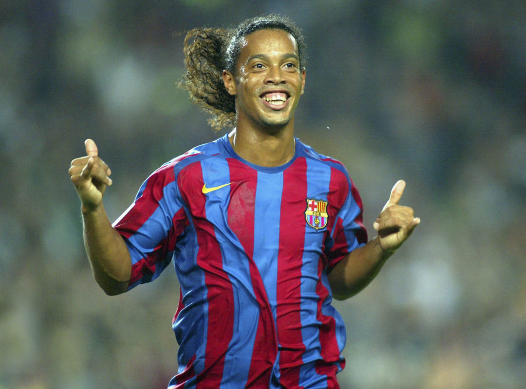 Ronaldinho celebrates during a Barcelona game