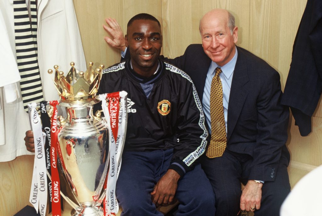 Andy Cole with Premier League title for Manchester United in 1997