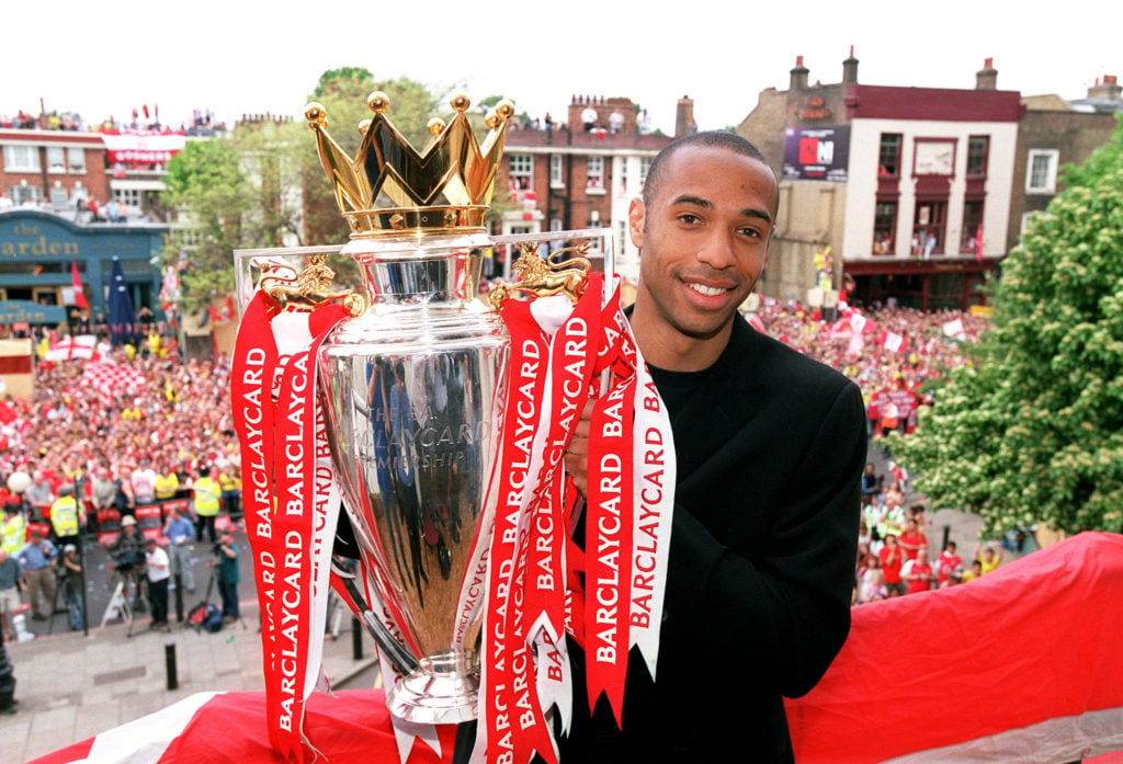 Arsenal legend Thierry Henry with 2003/04 Premier League trophy