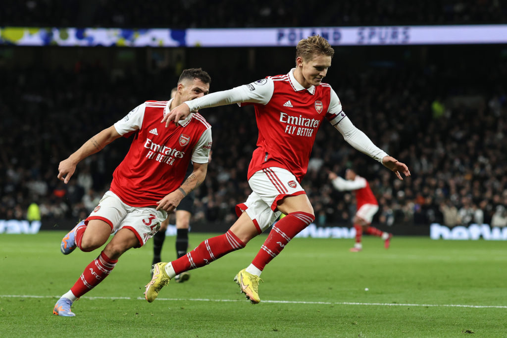 Arsenal captain Martin Odegaard scores against Tottenham.