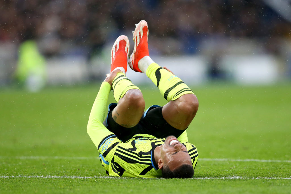 Arsenal defender Gabriel Magalhaes reacts after injury vs Brighton & Hove Albion in Premier League