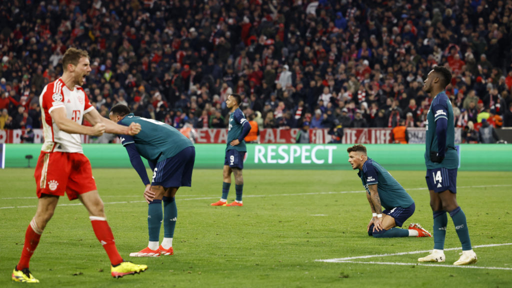Arsenal players Eddie Nketiah and Ben White react after losing at Bayern Munich in Champions League