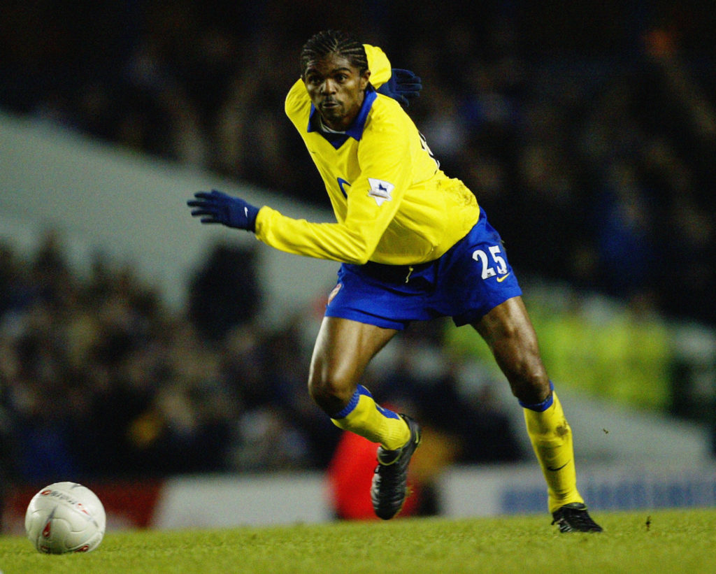 Nwankwo Kanu of Arsenal chases the loose ball