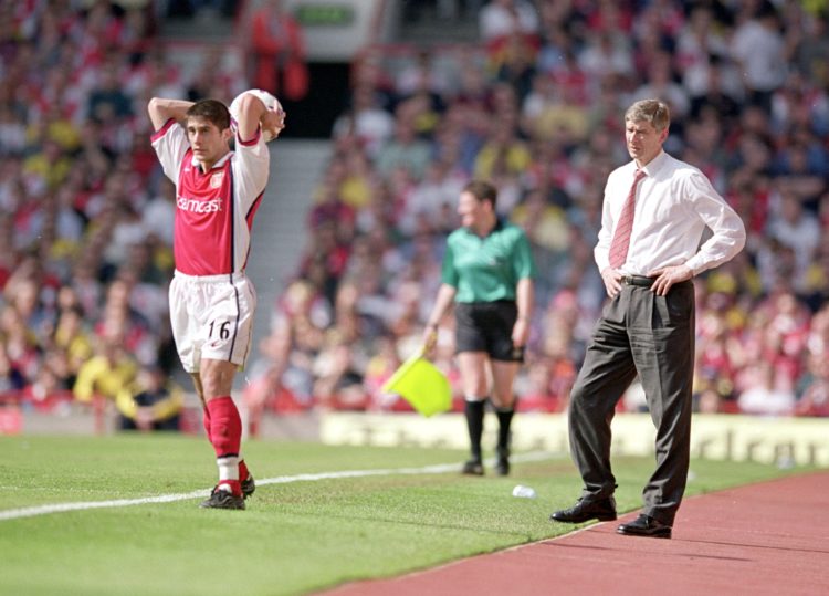 6 May 2000:  Silvinho of Arsenal takes a throw in watched by manager Arsene Wenger during the FA Carling Premiership game against Chelsea at Highbu...