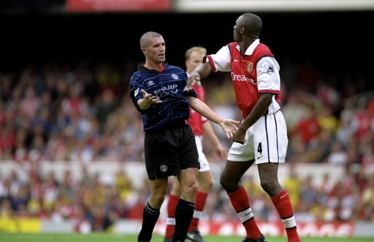 22 Aug 1999: Roy Keane of Manchester United clashes with Patrick Vieira of Arsenal during the FA Carling Premiership match against Arsenal played ...