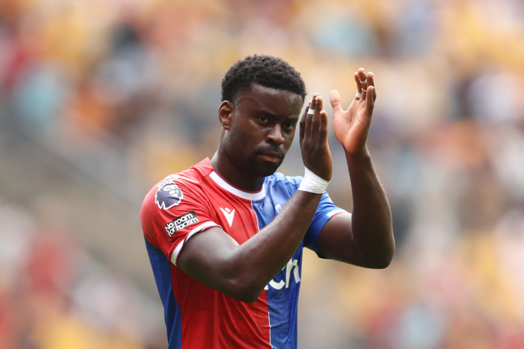 Marc Guehi applauding the fans after a Crystal Palace game
