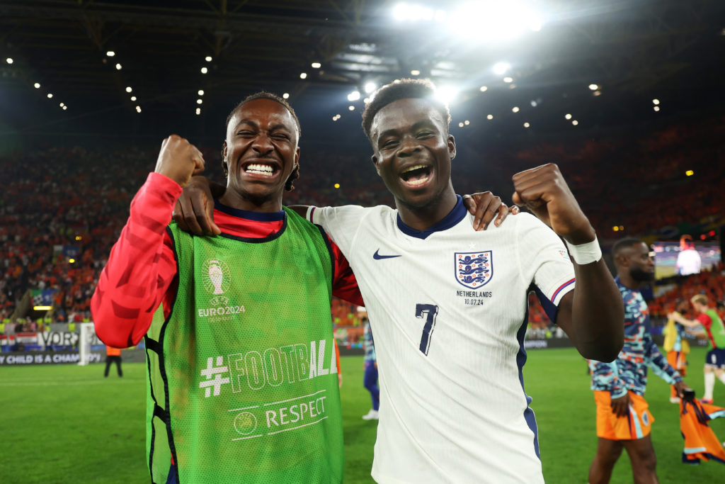 Eberechi Eze and Bukayo Saka of England celebrate following the UEFA EURO 2024 semi-final match between Netherlands and England at Football Stadium Dortmund on July 10, 2024