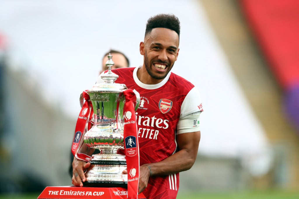 Pierre-Emerick Aubameyang lifts the FA Cup for Arsenal.
