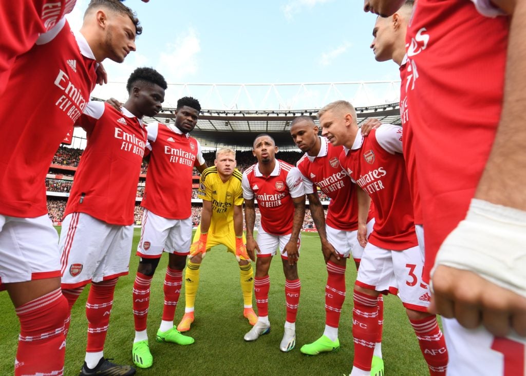 Gabriel Jesus speaks in a huddle before an Arsenal game