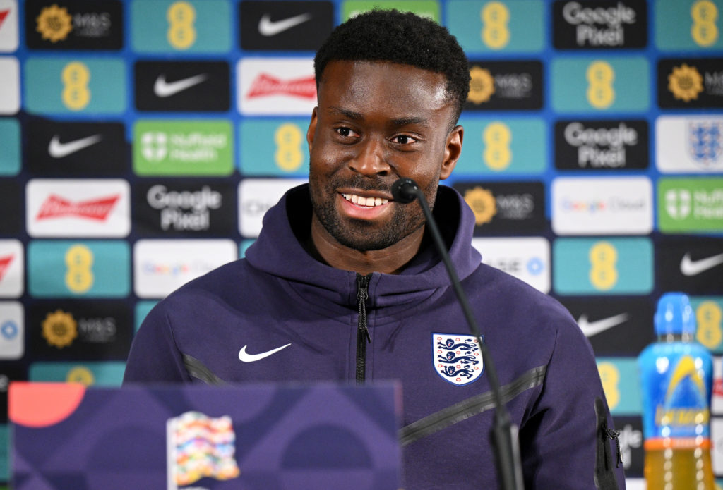 Marc Guehi smiling during an England Press Conference