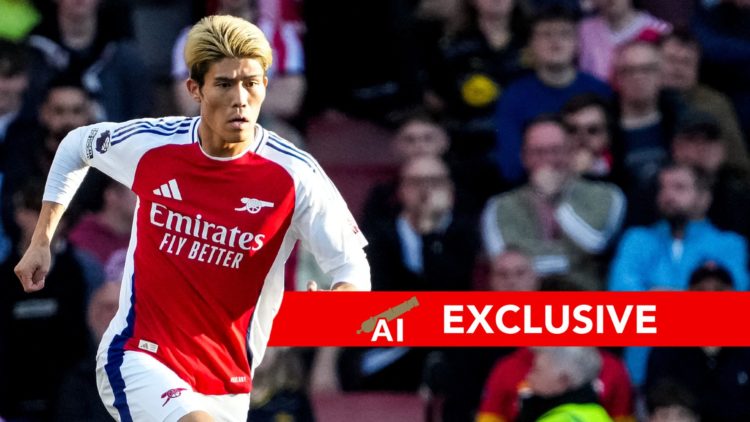 Takehiro Tomiyasu of Arsenal FC dribbles with the ball during the Premier League match between Arsenal FC and Southampton FC.