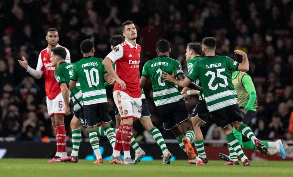 Arsenal's Granit Xhaka despairs as Sporting CP's Pedro Goncalves celebrates scoring his side's first goal during the UEFA Europa League round of 16 leg two match between Arsenal FC and Sporting CP at Emirates Stadium.