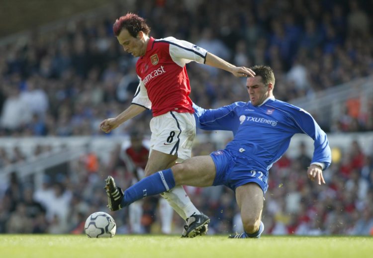21 Apr 2002:  Tommy Miller of Ipswich Town tries to tackle Fredrik Ljungberg of Arsenal during the FA Barclaycard Premiership match between Arsenal...