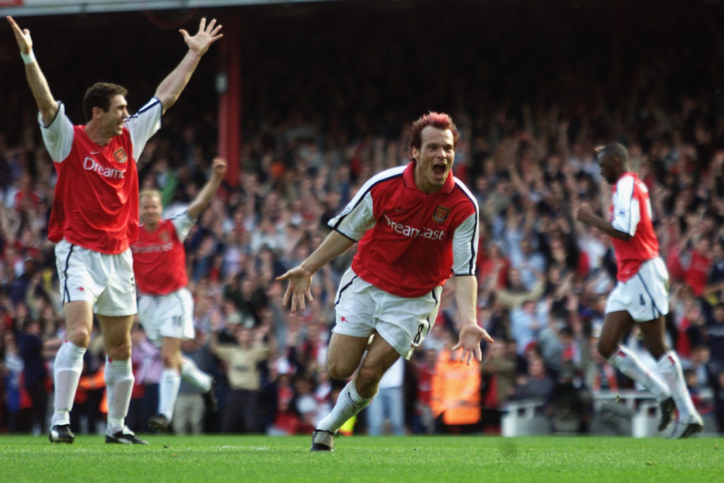 Fredrik Ljungberg of Arsenal celebrates scoring Arsenal's second goal