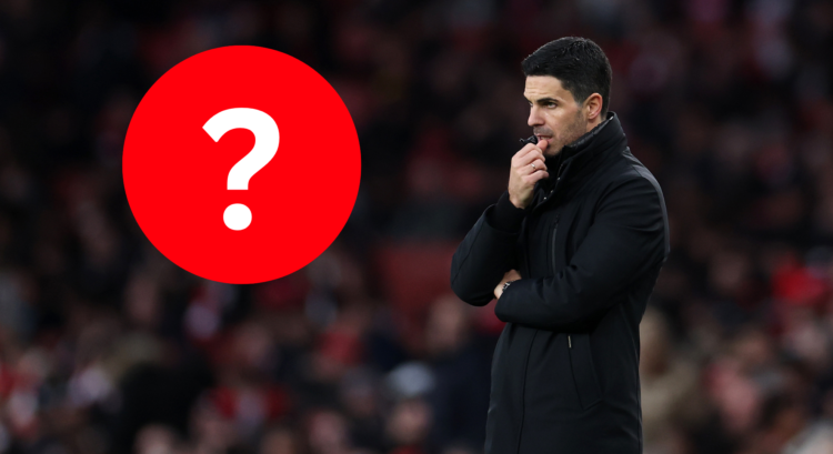 Arsenal boss Mikel Arteta looks on.