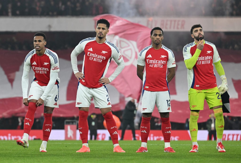 Gabriel Magalhaes, William Saliba, Jurrien Timber and David Raya look on before an Arsenal game