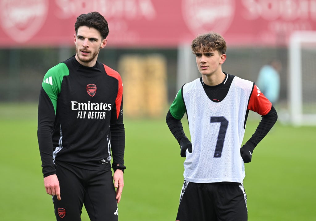Declan Rice and Max Dowman looking on during an Arsenal training session