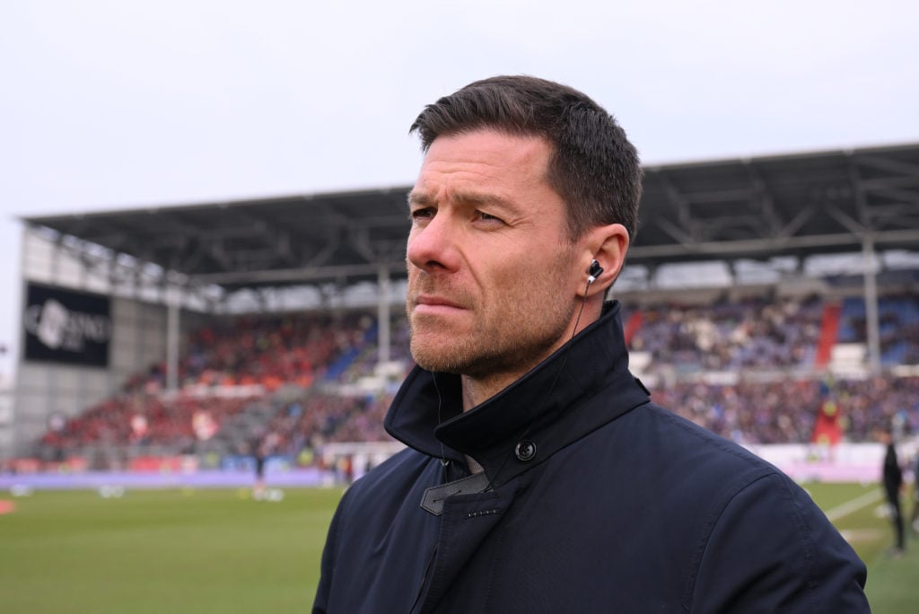 Xabi Alonso looking on during a Bayer Leverkusen game