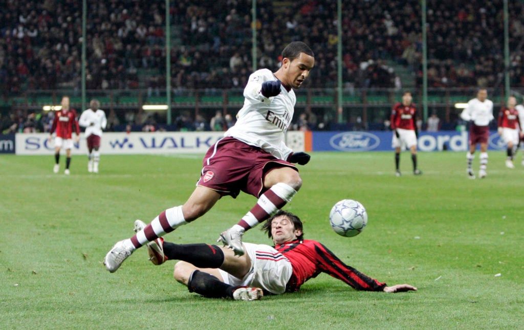 Theo Walcott in action during AC Milan v Arsenal in the UEFA Champions League clash.
