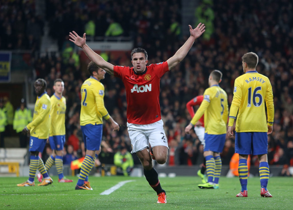 Robin van Persie celebrates scoring during Manchester United v Arsenal in the Premier League clash.
