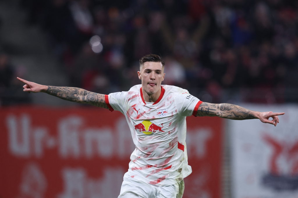 Benjamin Sesko celebrates during an RB Leipzig match