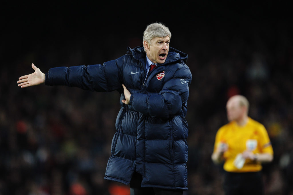 Arsene Wenger looking angry during an Arsenal game
