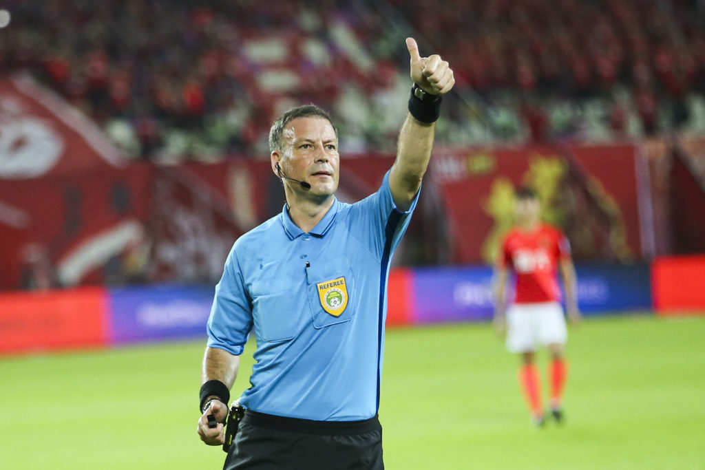 Referee Mark Clattenburg giving a thumbs up during a game in China