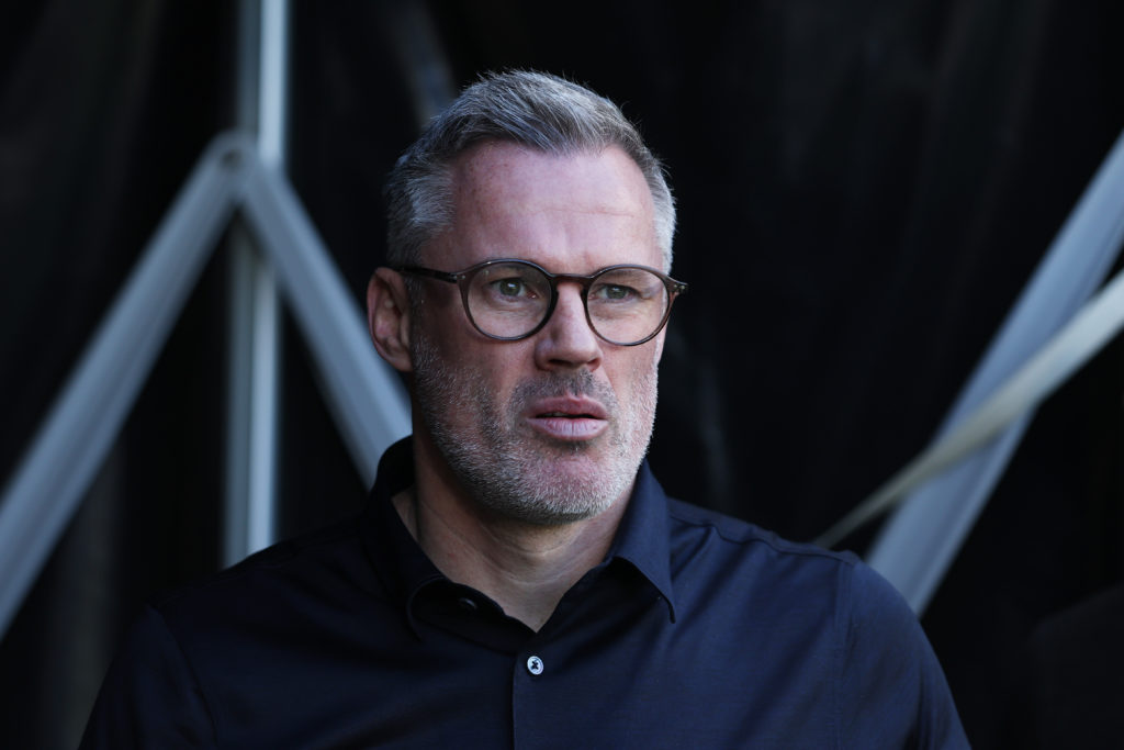 Pundit Jamie Carragher looking on before a Liverpool game