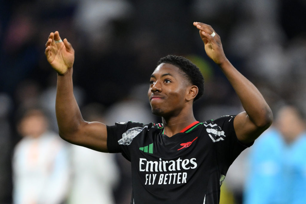 Myles Lewis-Skelly celebrating after Arsenal's win over Real Madrid in the Champions League.
