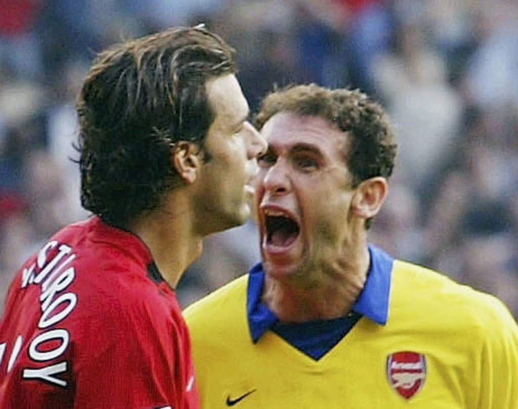 Martin Keown screams in Ruud Van Nistelrooy's face during Manchester United vs Arsenal