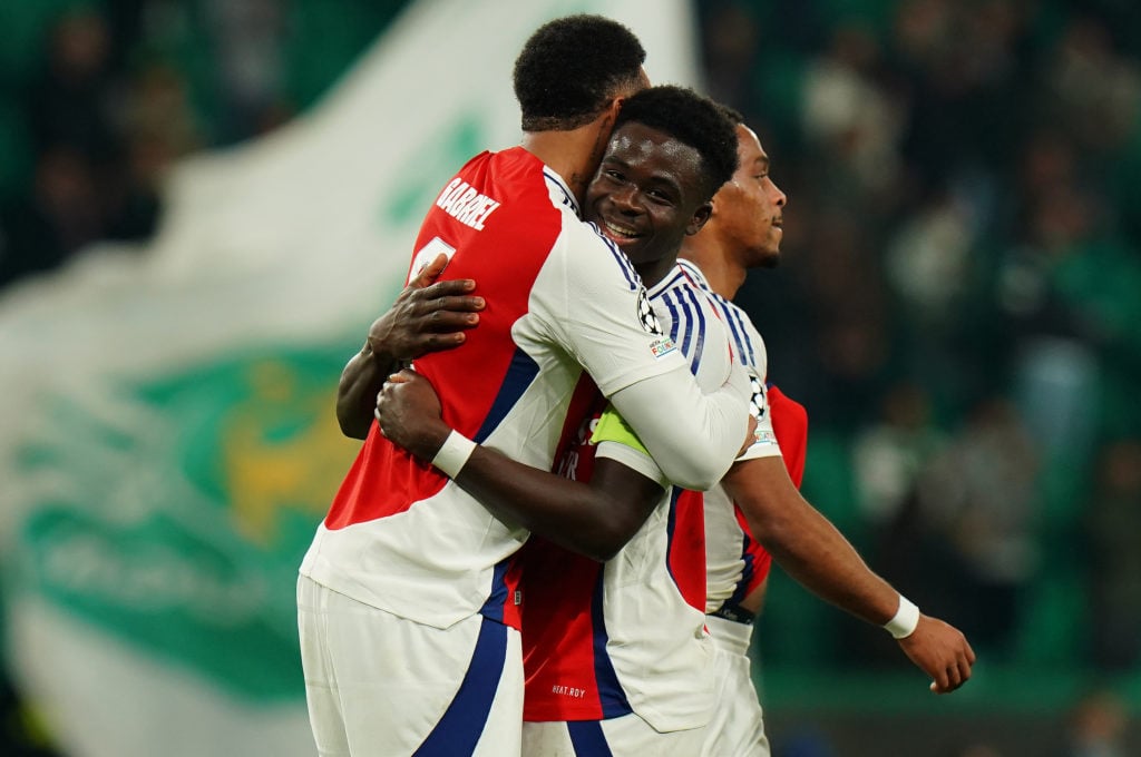 Gabriel Magalhaes and Bukayo Saka celebrate during Sporting Clube de Portugal v Arsenal FC in the UEFA Champions League 2024/25 League Phase clash.