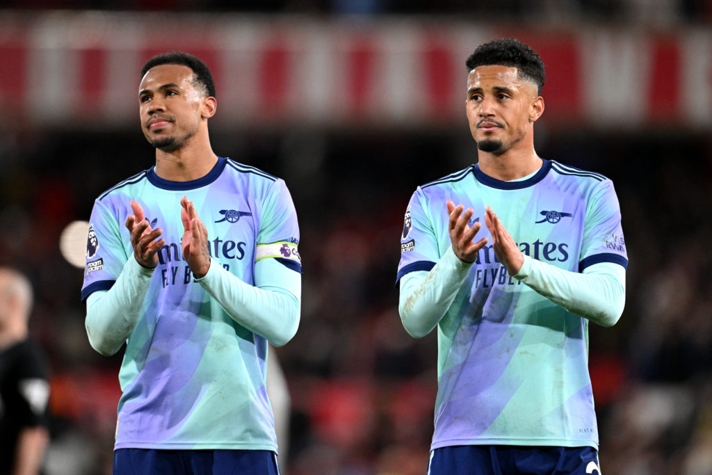 William Saliba and Gabriel Magalhaes applaud supporters after Nottingham Forest FC v Arsenal FC in the Premier League clash.