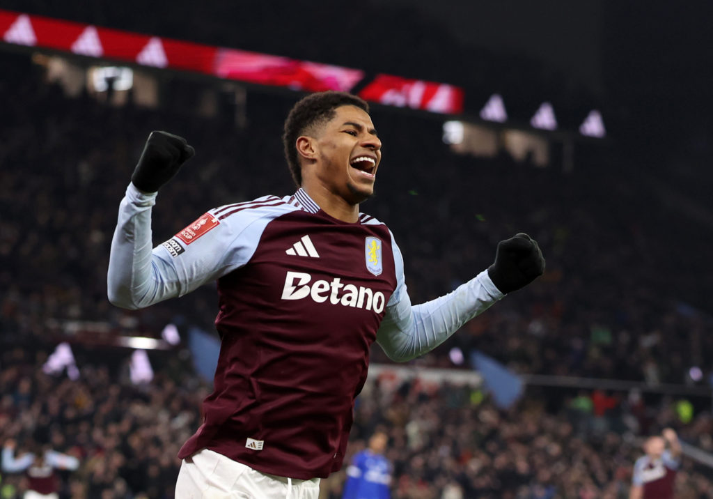 Marcus Rashford celebrates during an Aston Villa match