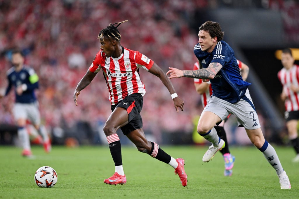 Nico Williams in action against Viktor Lindelof during Athletic de Bilbao v Manchester United in the UEFA Europa League