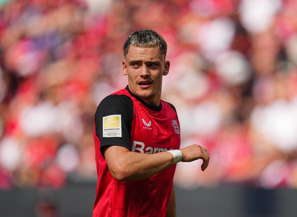 Florian Wirtz looks on during Bayer Leverkusen vs Borussia Dortmund