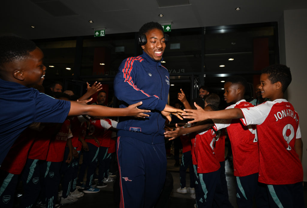 Myles Lewis-Skelly greeted by academy members before Arsenal FC v Newcastle United FC in the Premier League clash.