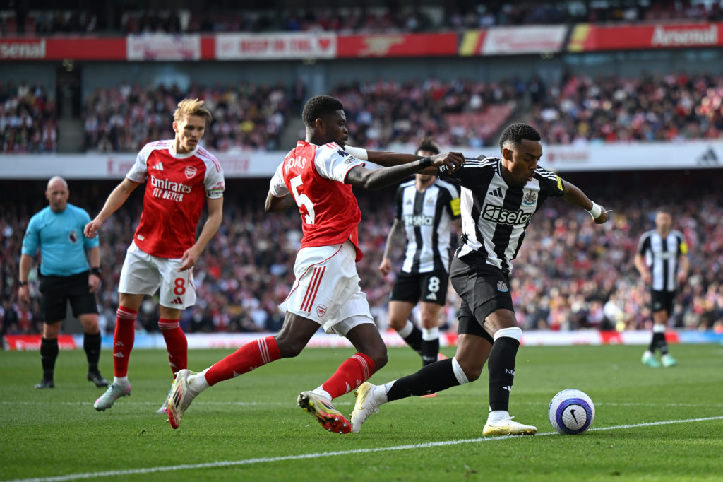 Thomas Partey challenges Joe Willock during Arsenal FC v Newcastle United FC in the Premier League.