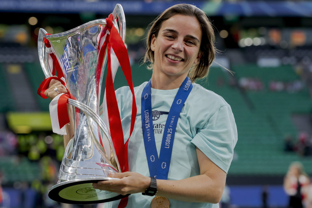 Arsenal head coach Renee Slegers lifts the Women's Champions League