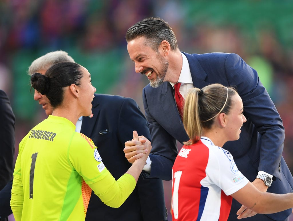 Josh Kroenke congratulates Manuela Zinsberger after Arsenal WFC v FC Barcelona in the UEFA Women's Champions League Final.