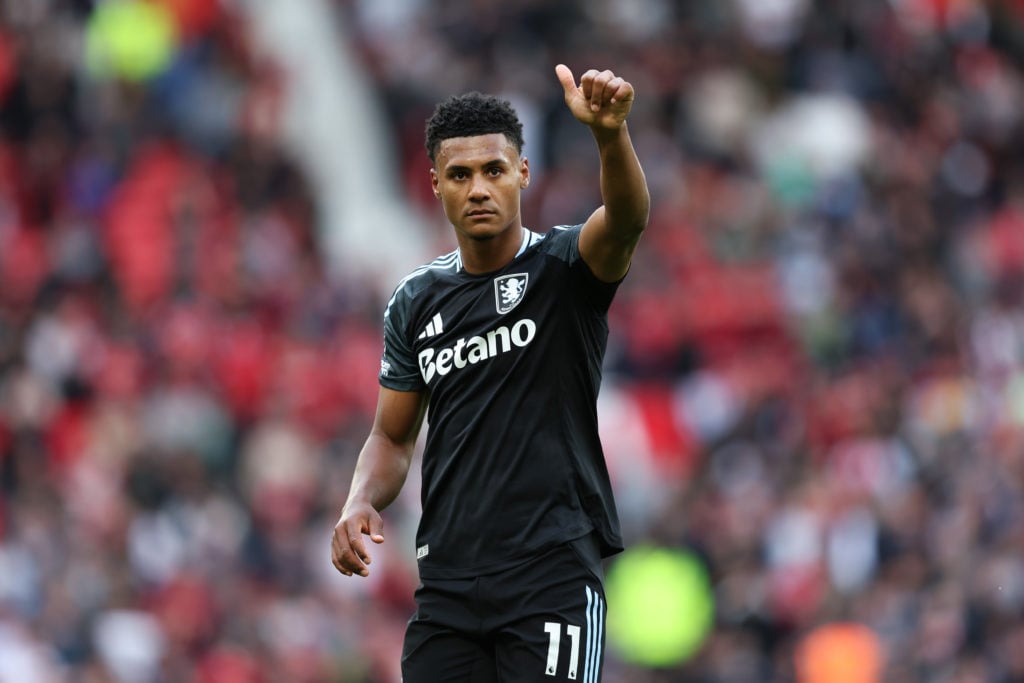 Arsenal target Ollie Watkins acknowledges the fans during Manchester United FC v Aston Villa FC in the Premier League clash.