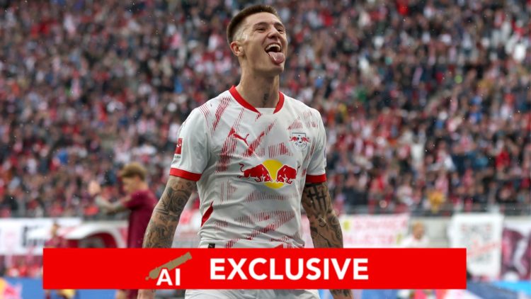 Image of Benjamin Sesko of RB Leipzig celebrates scoring his team's second goal during the Bundesliga match between RB Leipzig and FC Augsburg, Ins...