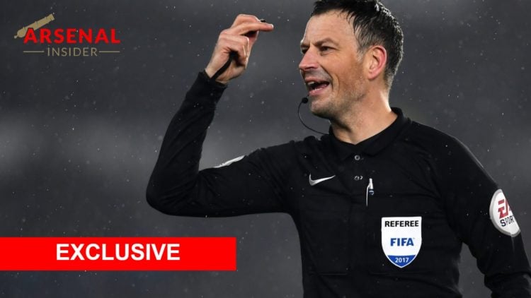 Mark Clattenburg gestures during a Premier League match