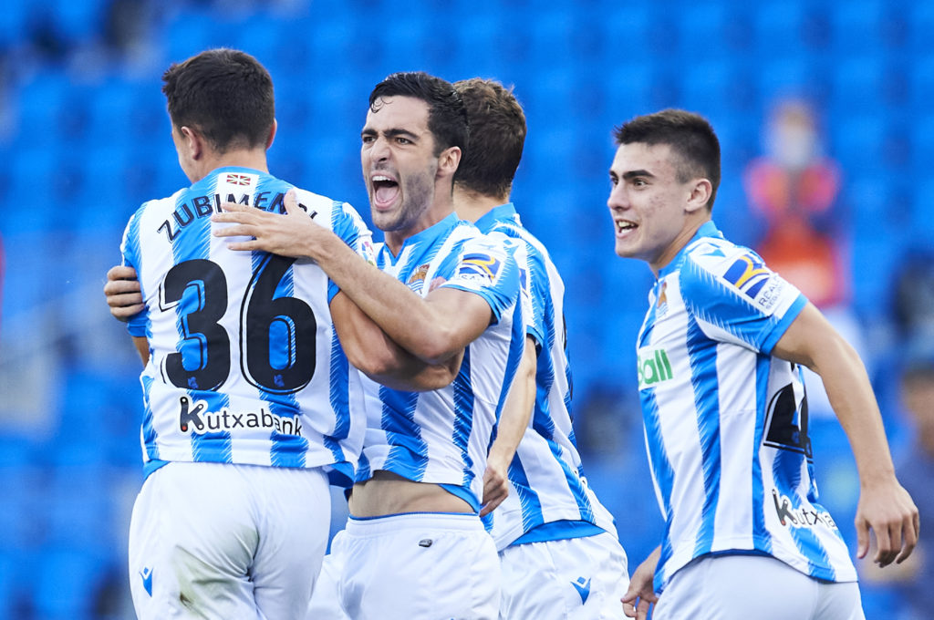Martin Zubimendi and Mikel Merino celebrate for Real Sociedad